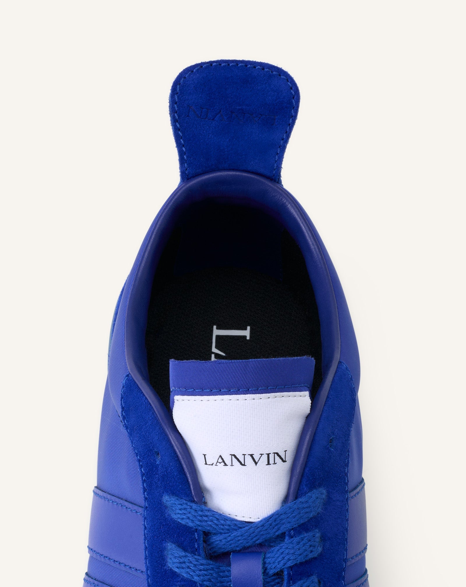 Blue Bumpr Nylon Sneakers